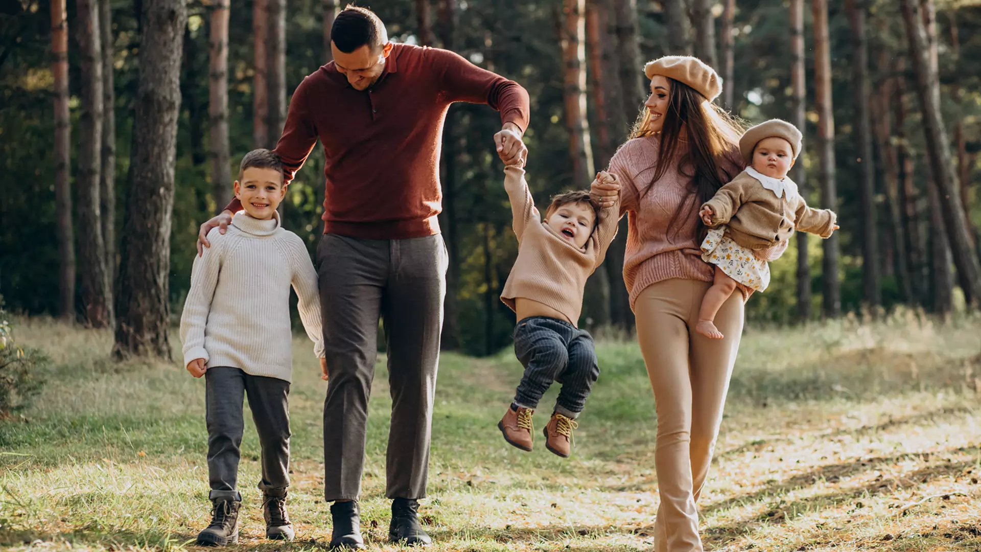 Happy family in the woods
